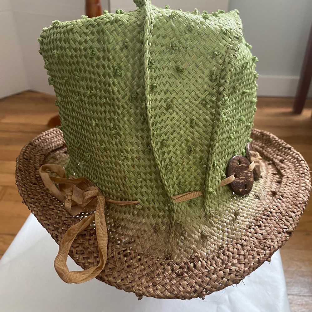 Suzette Art Couture multicolored straw hat.